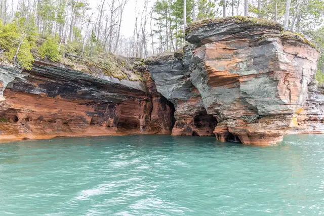 Sea caves above turquoise water