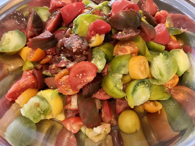 Bowl of sliced heirloom tomatoes