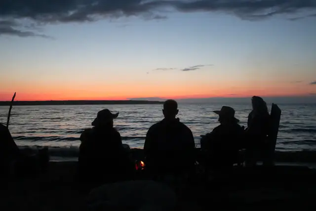 Friends watching the sunset in Cornucopia